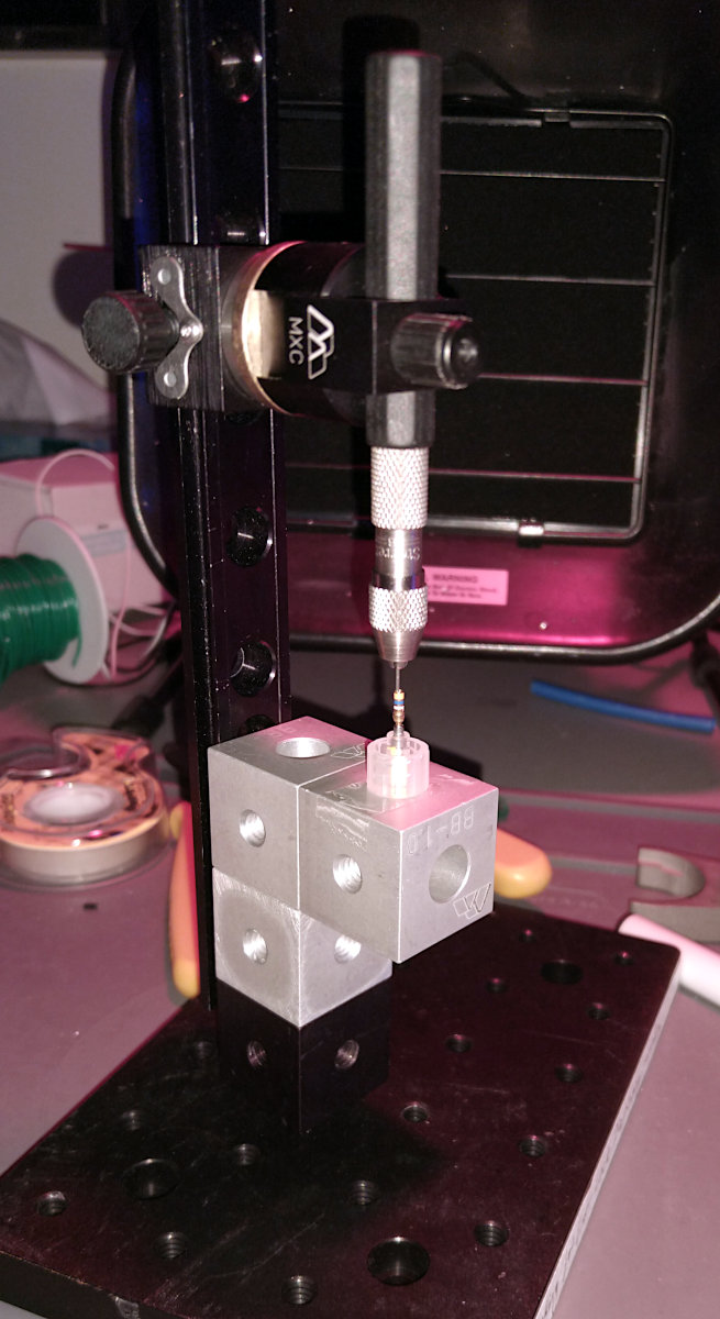 Vertical soldering contraption, allows more even distribution of flux and solder around the hypodermic tube