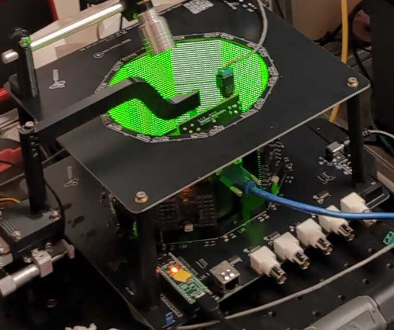 Course G6 LED arena mounted over the fly-on-ball treadmill, with the controller PCB and I/O connections visible below